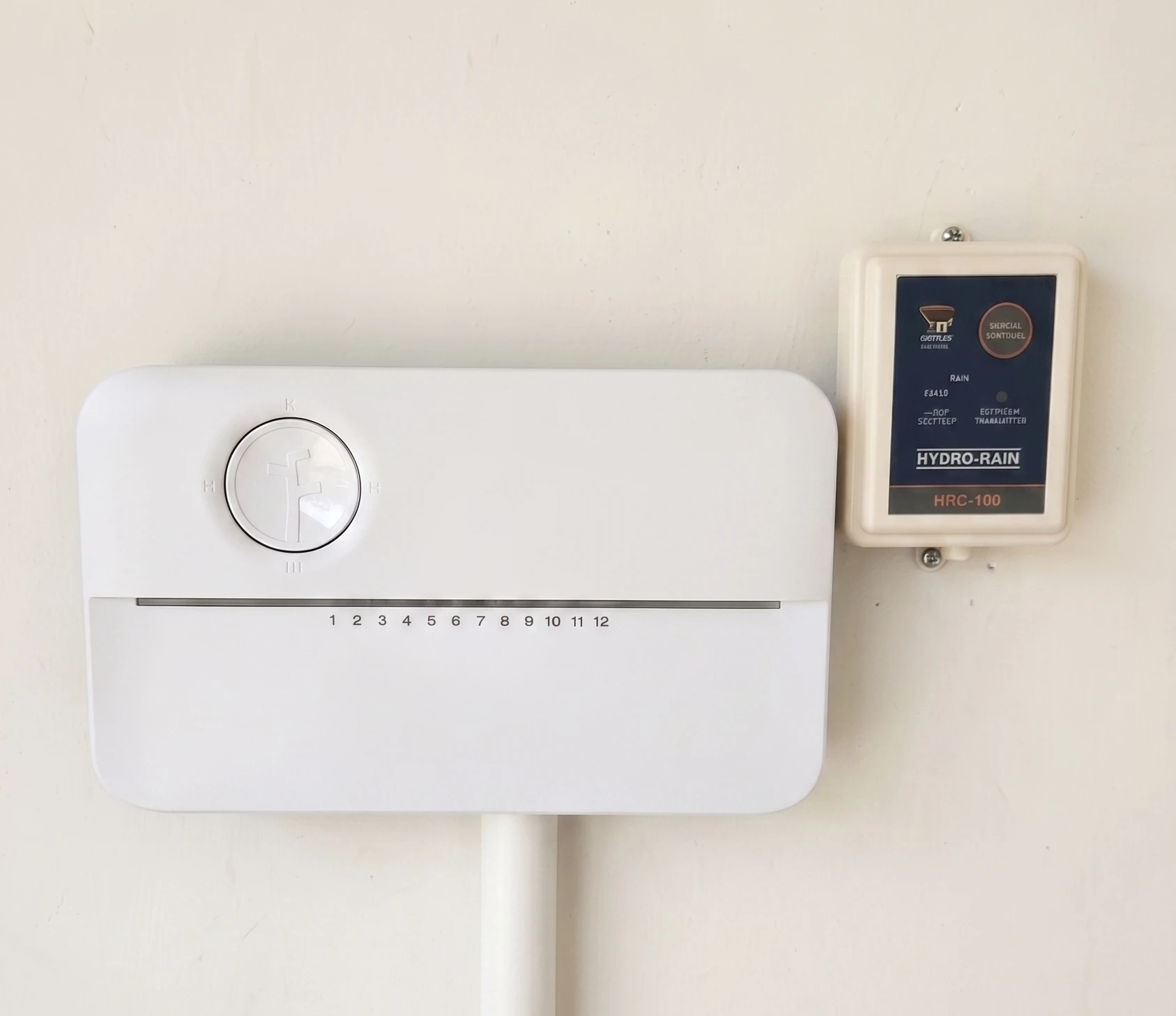 Rachio smart sprinkler controller installed by Husky Irrigation alongside a Hydro-Rain HRC-100 wireless receiver